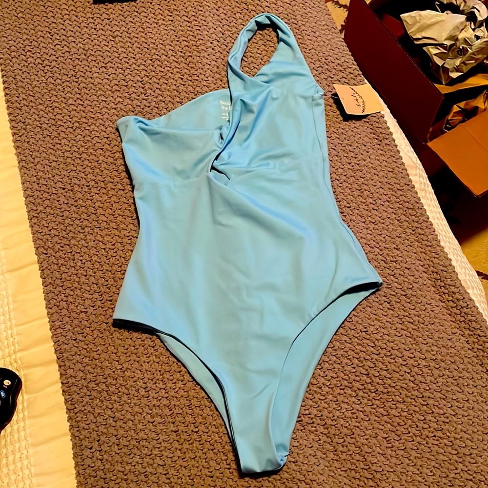 One piece boutique bathing suite.